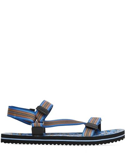 Burberry Icon Stripe And Monogram Print Sandals In Warm Royal Blue