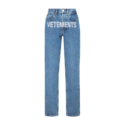Vetements Logo-print Denim Jeans In Blue