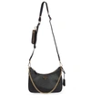 Prada Curved Black Bag With Gold Chain Strap And Logo Plaque In Black