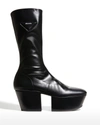 Prada Triangle Logo Platform Boots In Nero