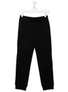 Balmain Embossed-logo Track Pants In Black
