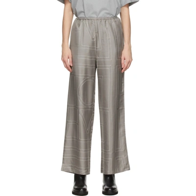 Totême Logo-embroidered Silk-satin Wide-leg Trousers In Skyscraper