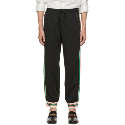 Gucci Logo-tape Relaxed-fit Jersey Jogging Bottoms In Black Mix