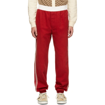 Gucci Gg-logo Side-stripe Cotton-drill Track Pants In Red