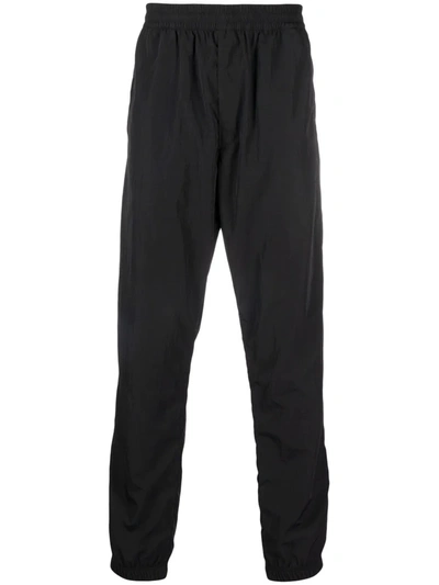 Givenchy Logo-embroidered Trackpants In Black