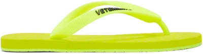 Vetements Logo-embellished Neon Rubber Flip Flops In Yellow