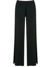 Lygia & Nanny Flared Pleated Trousers In Schwarz