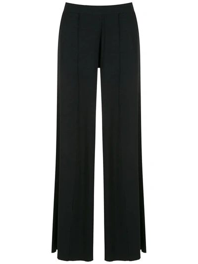 Lygia & Nanny Flared Pleated Trousers In Schwarz