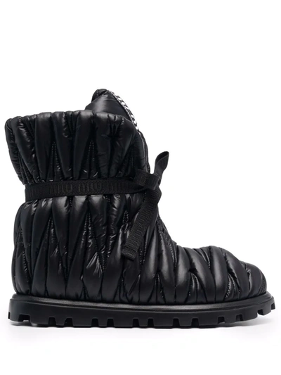 Miu Miu Quilted Logo-strap Ankle Boots In Black