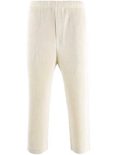 Issey Miyake Pleated Fabric Cropped Trousers In Nude