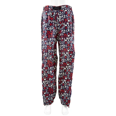 Moncler Monogram Logo Buckle Trousers In Blue