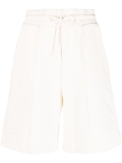 Msgm Embossed Logo Piped-trim Shorts In Nude