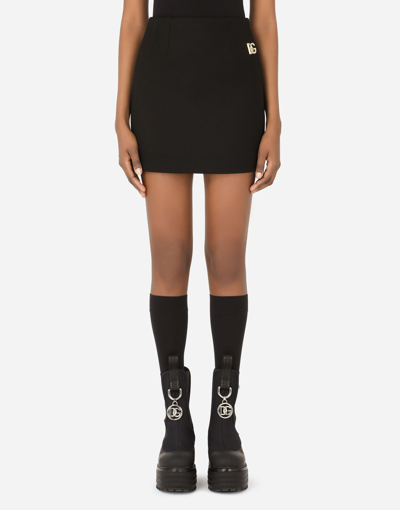 Dolce & Gabbana Double Crepe Miniskirt With Dg Embellishment In Black