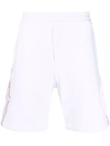 ALEXANDER MCQUEEN WHITE SELVEDGE LOGO-TAPE TRACK SHORTS