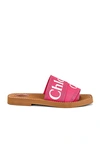 Chloé Woody Flat Logo Ribbon Slide Sandals In Hot Pink