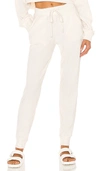 Alo Yoga Muse Ribbed High Waist Sweatpants In Ivory
