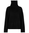 Totême Oversized Wool-blend Turtleneck Sweater In Black