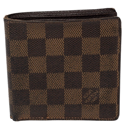 Pre-owned Louis Vuitton Damier Ebene Coated Canvas Bifold Wallet In Brown