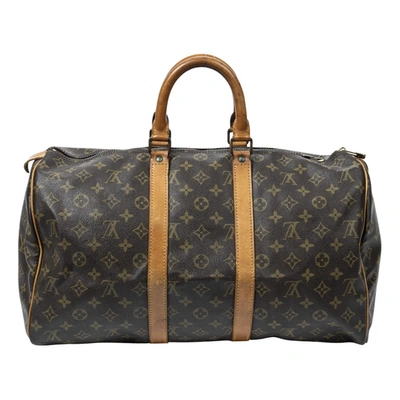 Pre-owned Louis Vuitton Keepall Leather Travel Bag In Brown
