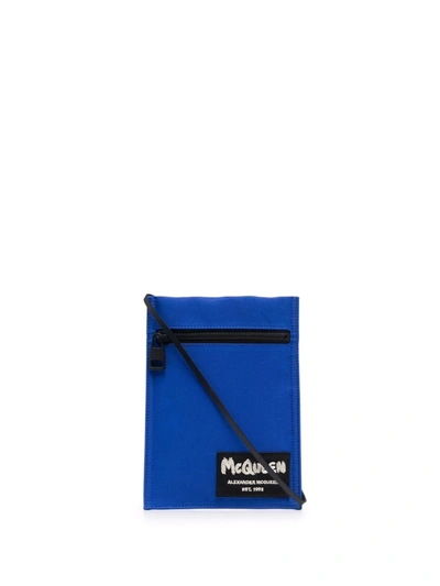 Alexander Mcqueen Leather-trimmed Logo-appliquéd Canvas Pouch In Blue