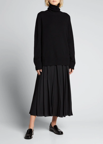 The Row Stepny Wool-cashmere Turtleneck Top In Dark Navy