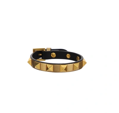 Valentino Garavani Garavani Rockstud Gold Leather Bracelet In Antique Brass/black