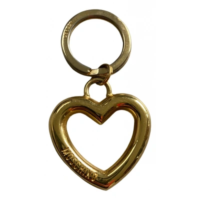 Pre-owned Moschino Bag Charm In Gold