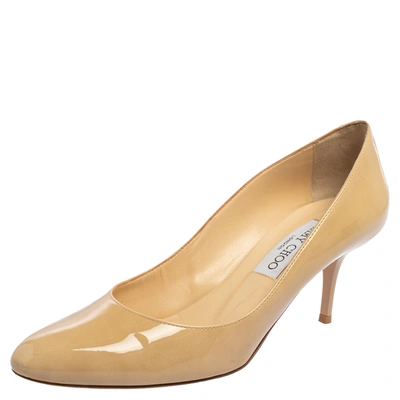 Pre-owned Jimmy Choo Nude Patent Leather Emi Pumps Size 37 In Beige