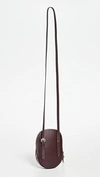 Jw Anderson Midi Cap Shiny Smooth Leather Bag In Bordeaux