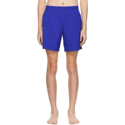 Alexander Mcqueen Logo-tape Slip-on Swim Shorts In Royal