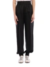 SAINT LAURENT LAMÈ KNITTED TROUSERS,602857Y724V1000
