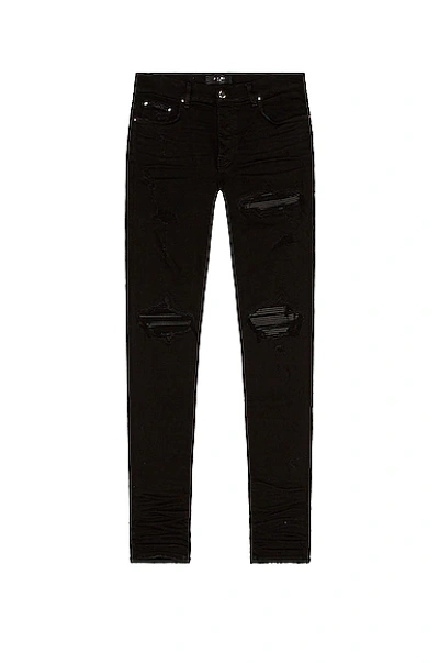 Amiri Mx1 Skinny-fit Distressed Leather-panelled Jeans In Black