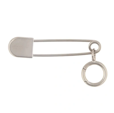 Burberry Brass Kilt Pin Key Charm In Natural Silver In Silver Tone,yellow