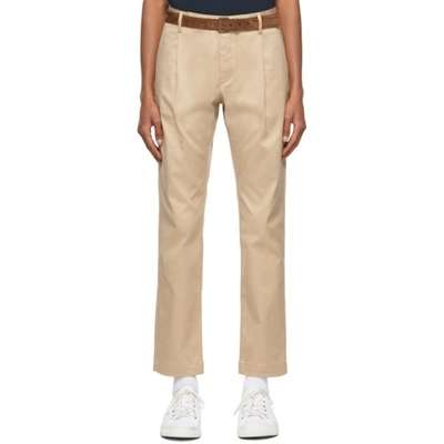 Saint Laurent Tapered Pleated Cotton-blend Twill Chinos In Neutrals