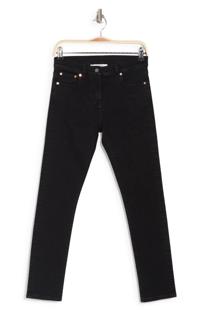 Valentino Leather-trimmed Bleached Mid-rise Skinny Jeans In Nero/denim