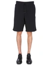 Moschino Embroidered-logo Jogger Shorts In Nero