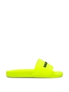 Balenciaga Logo-detailed Rubber Slides In Yellow