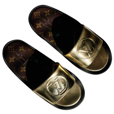 Pre-owned Louis Vuitton Leather Mules In Gold