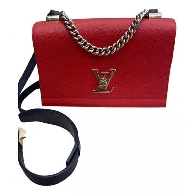 Pre-owned Louis Vuitton Lockme Leather Handbag In Red