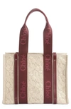 CHLOÉ MEDIUM WOODY EMBROIDERED CANVAS TOTE,C21AS383F09