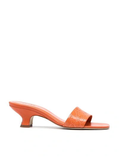 By Far Ceni Crocodile-embossed Mules In Orange