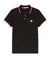 Moncler This Polo Shirt Features A Timeless Design That Transcends The Seasons In Black