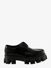 Prada Monolith Brushed Leather Derby Shoes In Black