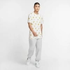 Nike Standard Issue Pants In Birch Heather/pale Ivory
