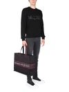 ALEXANDER MCQUEEN JEANS WITH EMBROIDERED LOGO