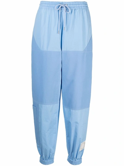 Stella Mccartney + Net Sustain Kara Paneled Organic Cotton-ripstop And Shell Track Pants In Light Blue