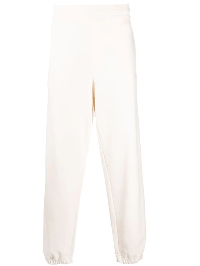 Msgm Solid Colour Joggers With Logo Print In Cream