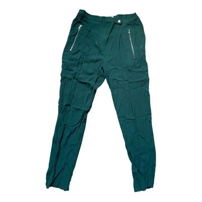 Pre-owned Sandro Trousers In Green