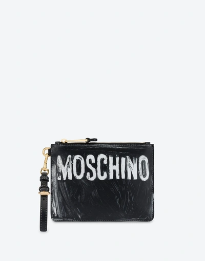 Moschino Painted Logo Calfskin Clutch In Black