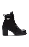 Prada Brushed Leather And Nylon Laced Booties In Black